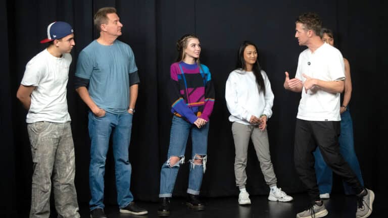 Matthew Dearing gives notes to a line of acting students on stage at Dearing Acting Studio, Phoenix