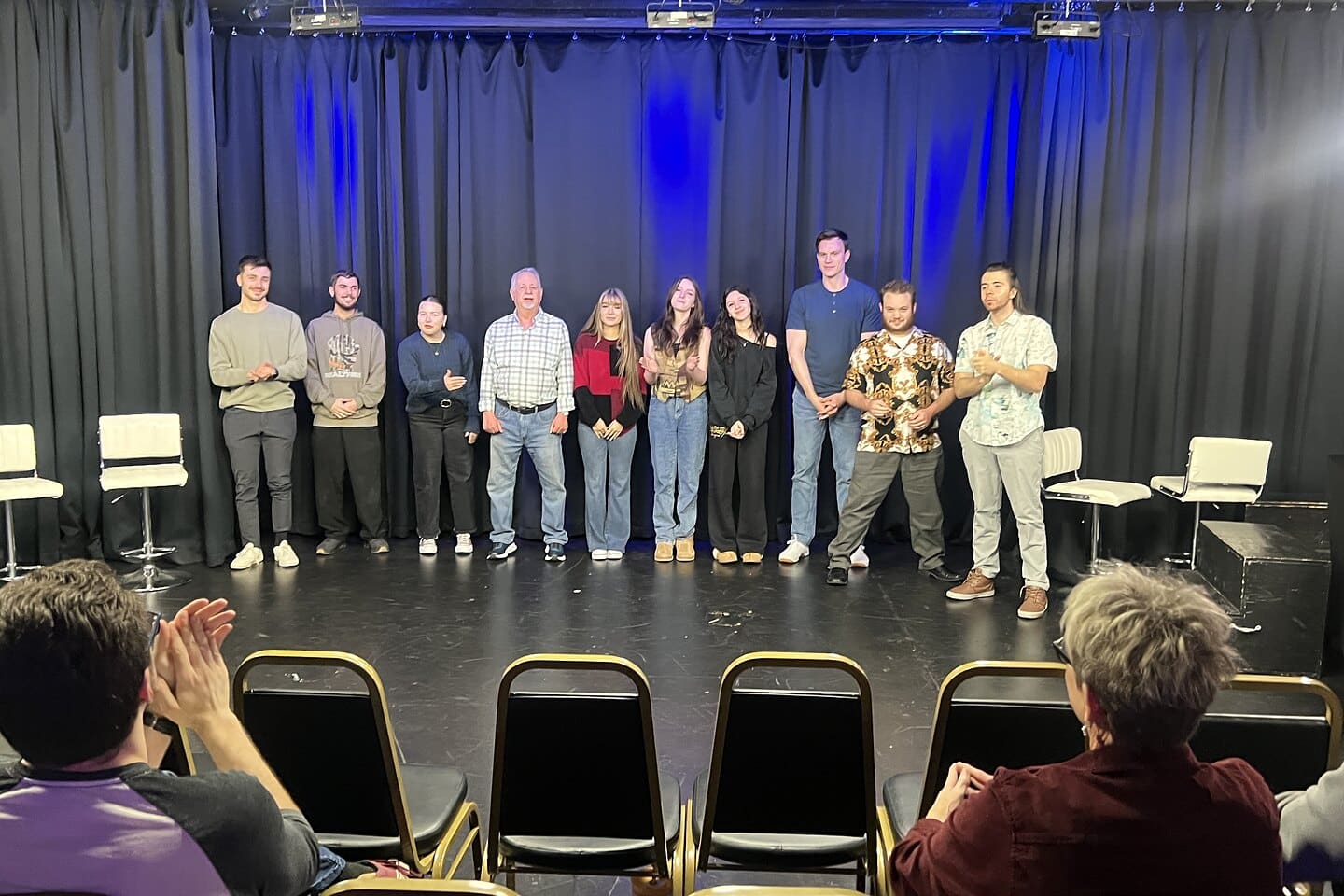 An adult improv showcase at Dearing Acting Studio, the class on stage