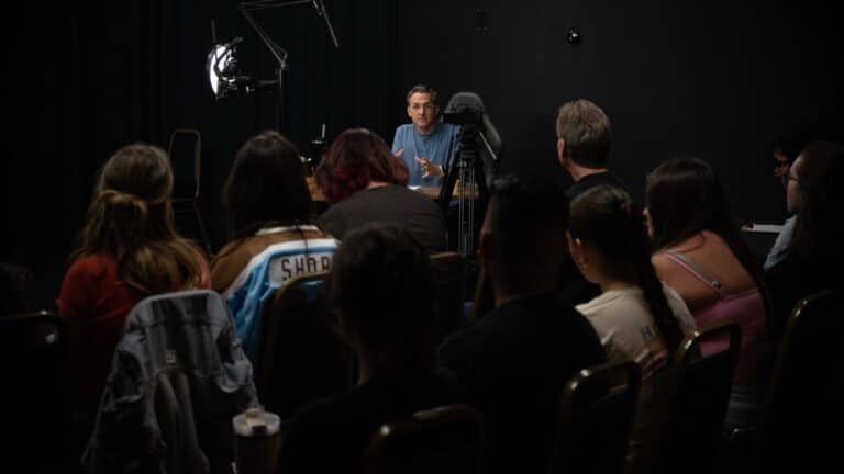 Adult script acting class in Phoenix: Matthew Dearing coaching a full room of adult students on camera at Dearing Acting Studio