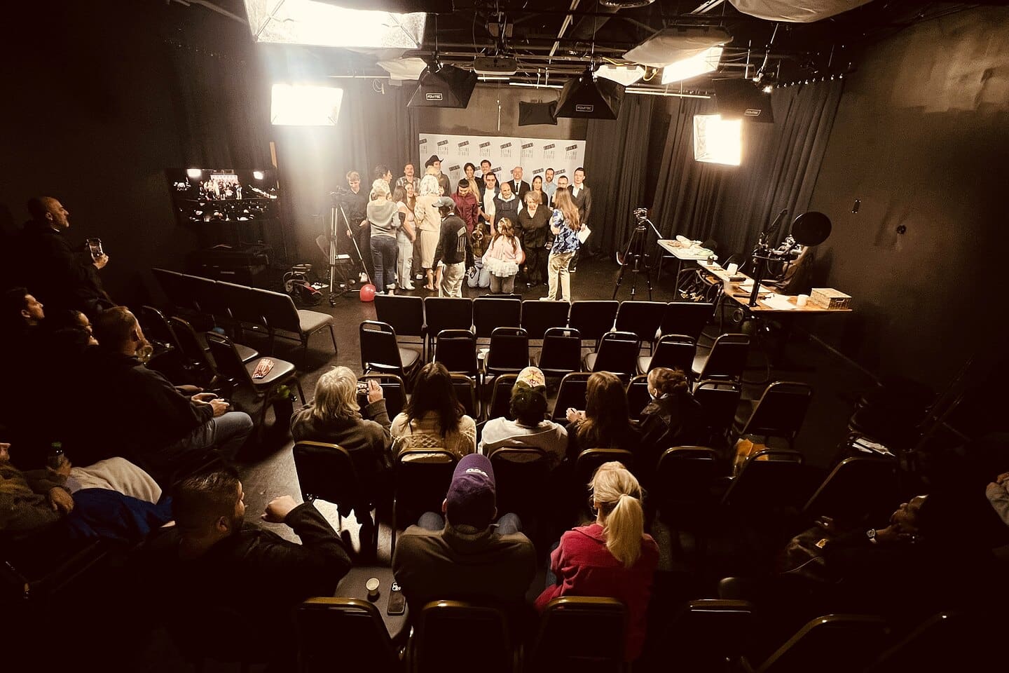 An adult script showcase at Dearing Acting Studio, the room from the back