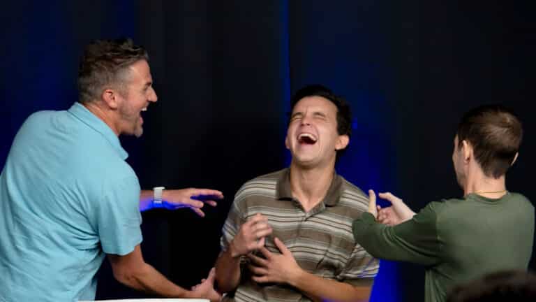 Students break into laughter mid-scene at a Dearing Acting Studio showcase in Phoenix