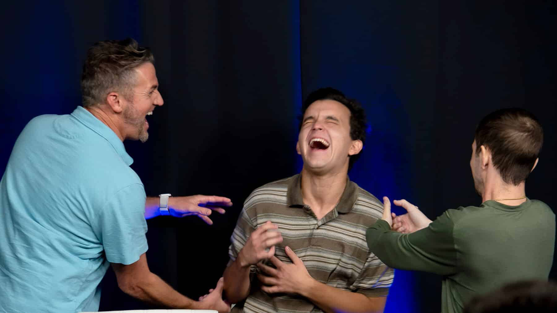 Students break into laughter mid-scene at a Dearing Acting Studio showcase in Phoenix
